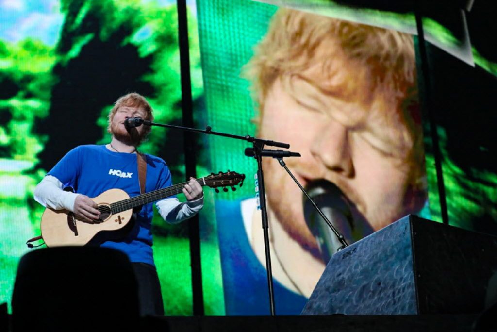 Ed Sheeran performs at Miller Park singing songs about lovers